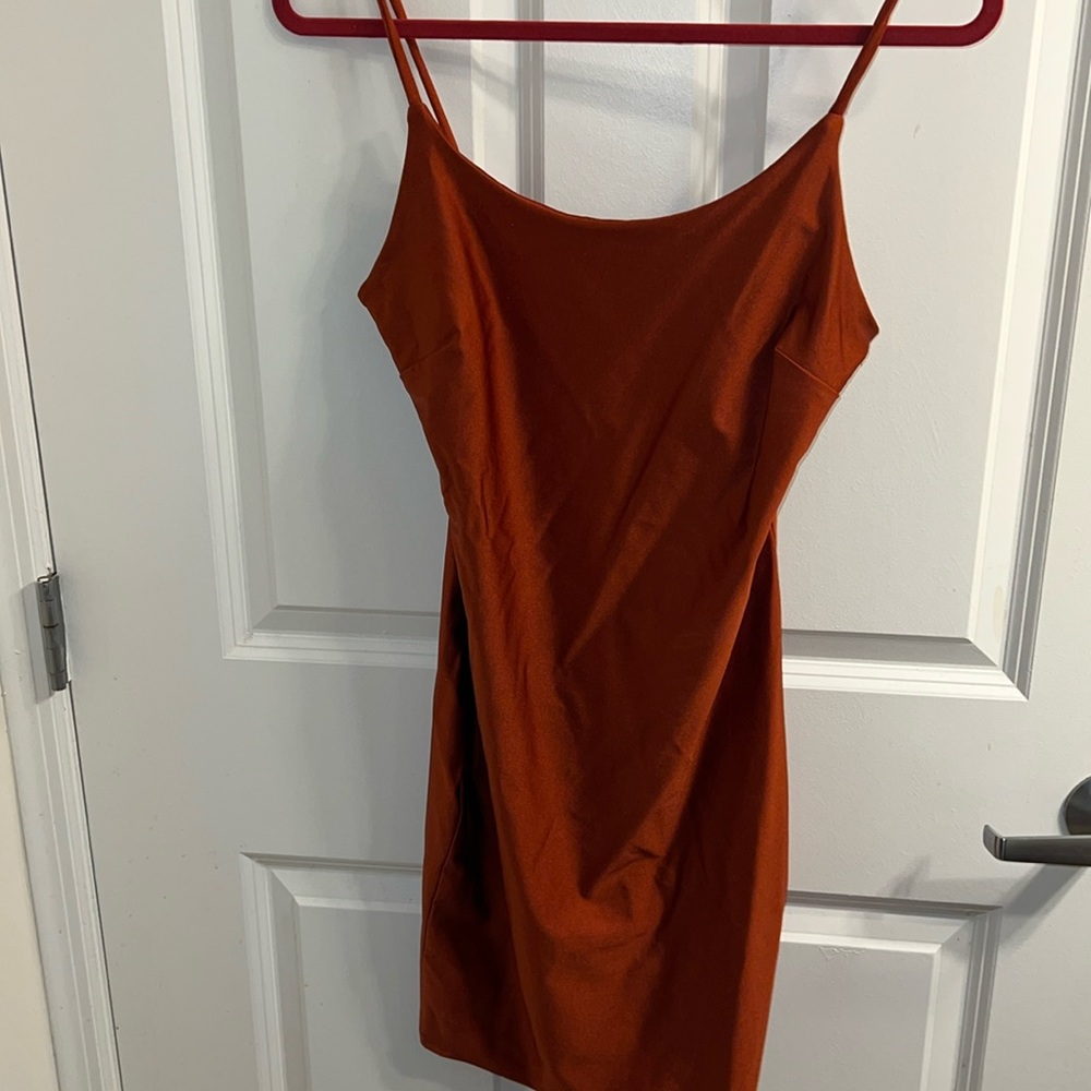 Burnt orange form fitting dress